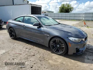 2017 BMW M4 with VIN WBS3R9C59HK709761, listed as a Copart auction lot 64412514 with 53,592 mi miles and Salvage Title. Bid and sale history available at carsss.com. Image 4.