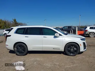 2022 Cadillac XT6 Premium Luxury with VIN 1GYKPCRS2NZ177625, listed as a IAAI auction lot 41646155 with 94,694 mi miles and . Bid and sale history available at DreamBid. Image 13.