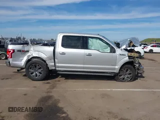 2015 Ford F-150 XLT with VIN 1FTEW1EG3FKD37310, listed as a IAAI auction lot 41681029 with 145,069 mi miles. Bid and sale history available at carsss.com. Image 14.