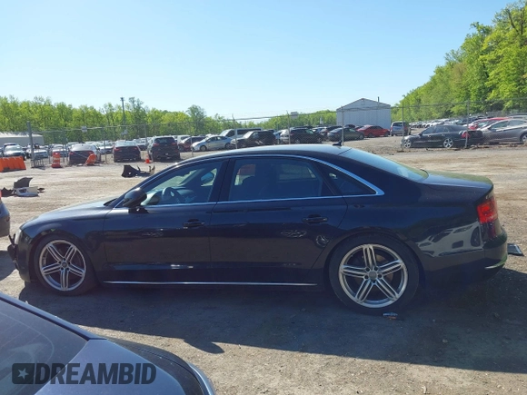 2013 Audi A8 3.0L with VIN WAURGAFD0DN005532, listed as a IAAI auction lot 42113540 with 176,635 mi miles and . Bid and sale history available at DreamBid. Image 14.