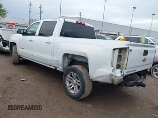 2017 Chevrolet Silverado 1500 LT with VIN 3GCPCREC7HG212382, listed as a IAAI auction lot 41896791 with 129,264 mi miles. Bid and sale history available at carsss.com. Image 3.