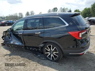 2020 Honda Pilot Touring 8-Passenger with VIN 5FNYF5H95LB021658, listed as a Copart auction lot 58878594 with 36,122 mi miles and Salvage Title. Bid and sale history available at DreamBid. Image 2.
