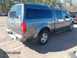 2007 Nissan Frontier SE with VIN 1N6AD09W37C440512, listed as a IAAI auction lot 41595588 with 252,175 mi miles. Bid and sale history available at carsss.com. Image 4.
