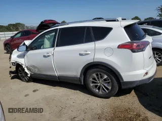 2016 Toyota RAV4 Hybrid XLE with VIN JTMRJREV2GD058966, listed as a Copart auction lot 58908824 with 0 mi miles and Salvage Title. Bid and sale history available at carsss.com. Image 2.