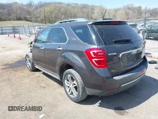 2016 Chevrolet Equinox LTZ z VIN 2GNFLGEK1G6284168, wystawiony jako IAAI lot #41937389 z przebiegiem 184 853 mil mil oraz . Historia ofert i sprzedaży dostępna na DreamBid. Obrazek 3.
