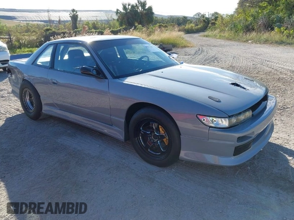 1992 Nissan 240SX z VIN JN1MS34P9NW100593, wystawiony jako IAAI lot #40867667 z przebiegiem Nie podano mil oraz . Historia ofert i sprzedaży dostępna na DreamBid. Obrazek 1.