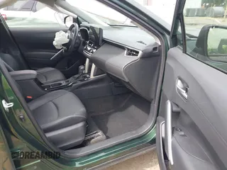 2023 Toyota Corolla Cross XLE with VIN 7MUEAAAG9PV053569, listed as a IAAI auction lot 42319709 with 71,105 mi miles and . Bid and sale history available at DreamBid. Image 5.