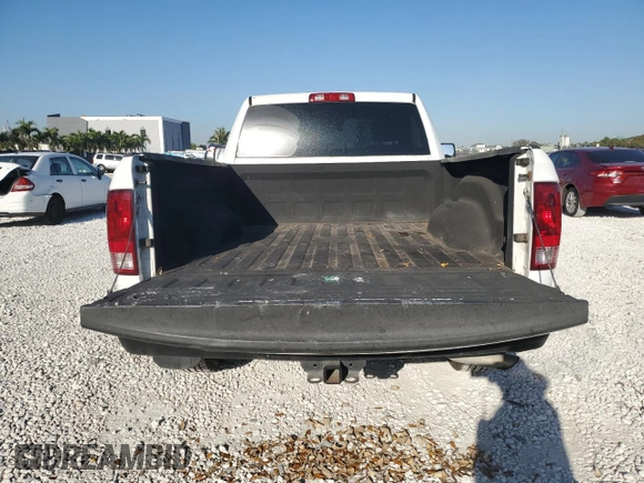 2014 Ram 1500 Tradesman с VIN 3C6JR6AG1EG184092, выставлен на аукционе Copart как лот 47653155 с пробегом 122 706 миль миль и Списание • Salvage title. История ставок и продаж доступна на DreamBid. Изображение 6.