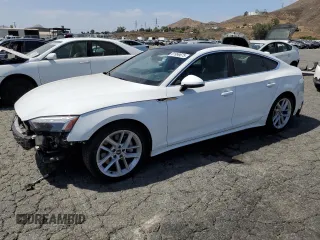2024 Audi A5 Sportback S line Premium Plus z VIN WAUFACF58RA013935, wystawiony jako Copart lot #61999675 z przebiegiem 30 054 mil mil oraz Szkoda całkowita • Salvage title. Historia ofert i sprzedaży dostępna na DreamBid. Obrazek 1.