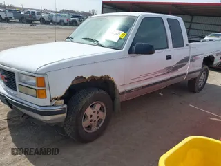 1995 GMC Sierra 1500 z VIN 2GTEK19K0S1580688, wystawiony jako IAAI lot #41811015 z przebiegiem 143 260 mil mil oraz . Historia ofert i sprzedaży dostępna na DreamBid. Obrazek 17.