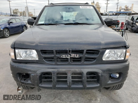 2001 Isuzu Rodeo S with VIN 4S2CK58W814333364, listed as a Copart auction lot 84656114 with 140,489 mi miles and Salvage title. Bid and sale history available at DreamBid. Image 5.
