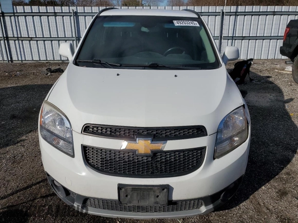 2012 Chevrolet Orlando 1LT z VIN KL77P2EM3CK586541, wystawiony jako Copart lot #49203245 z przebiegiem 121 436 mil mil oraz Tytuł czysty. Historia ofert i sprzedaży dostępna na DreamBid. Obrazek 5.