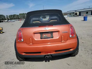 2006 MINI Convertible S with VIN WMWRH33576TF89127, listed as a Copart auction lot 49763365 with 150,446 mi miles and Salvage title. Bid and sale history available at DreamBid. Image 6.