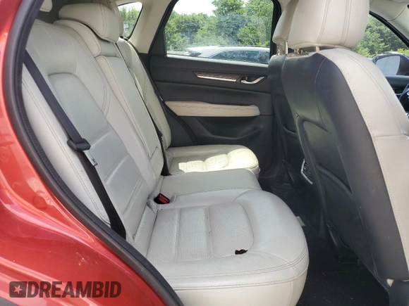 2018 Mazda CX-5 Grand Touring с VIN JM3KFBDM1J0332117, выставлен на аукционе Copart как лот 59379085 с пробегом 95 527 миль миль и Списание • Salvage title. История ставок и продаж доступна на DreamBid. Изображение 10.