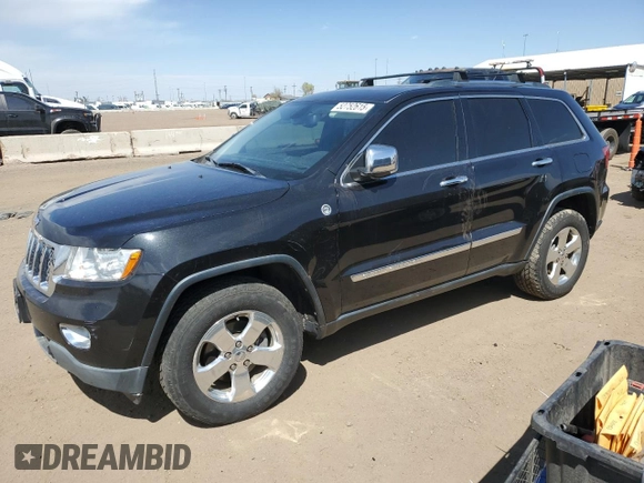 2013 Jeep Grand Cherokee Overland with VIN 1C4RJFCG5DC638927, listed as a Copart auction lot 52752615 with 117,494 mi miles and Salvage Title. Bid and sale history available at carsss.com. Image 1.
