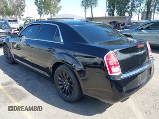 2014 Chrysler 300 with VIN 2C3CCAAG9EH264914, listed as a IAAI auction lot 42003052 with 103,789 mi miles. Bid and sale history available at carsss.com. Image 3.