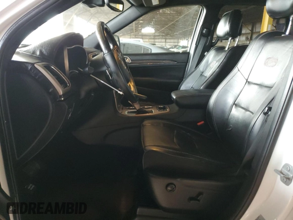 2017 Jeep Grand Cherokee Overland with VIN 1C4RJFCG2HC834328, listed as a Copart auction lot 45199855 with 87,061 mi miles and Salvage Title. Bid and sale history available at carsss.com. Image 7.