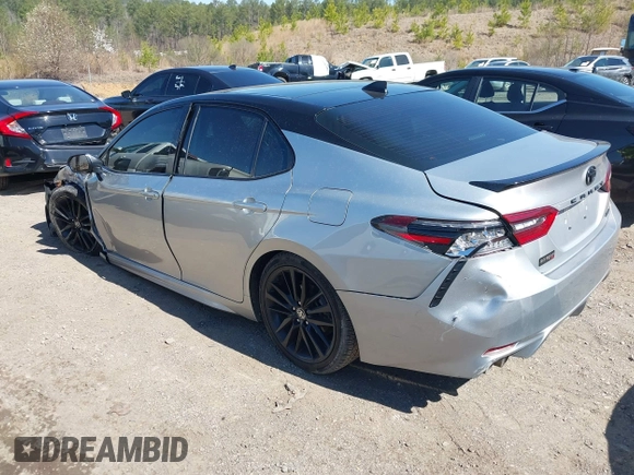 2022 Toyota Camry TRD with VIN 4T1KZ1AK8NU061810, listed as a IAAI auction lot 41769584 with 79,709 mi miles and . Bid and sale history available at DreamBid. Image 3.