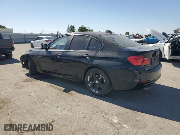 2014 BMW 3 Series 328i with VIN WBA3C1C5XEK106904, listed as a Copart auction lot 60565595 with 91,576 mi miles and Salvage title. Bid and sale history available at DreamBid. Image 2.