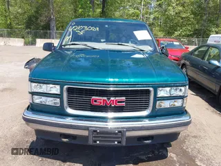 1997 GMC Suburban with VIN 3GKFK16R5VG508908, listed as a IAAI auction lot 42103068 with 264,446 mi miles and . Bid and sale history available at DreamBid. Image 13.