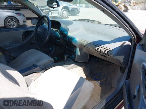 1994 Chevrolet Beretta z VIN 1G1LV15M9RY253342, wystawiony jako IAAI lot #42047160 z przebiegiem 131 763 mil mil oraz . Historia ofert i sprzedaży dostępna na DreamBid. Obrazek 5.