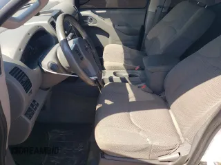 2016 Nissan Frontier S with VIN 1N6AD0EV4GN774095, listed as a Copart auction lot 51939555 with 218,471 mi miles and Salvage title. Bid and sale history available at DreamBid. Image 7.