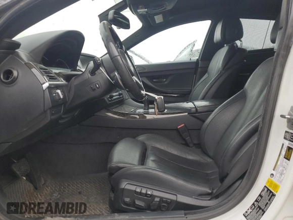 2015 BMW 6 Series 640i xDrive z VIN WBA6B8C55FD452972, wystawiony jako Copart lot #44559495 z przebiegiem 114 358 mil mil oraz Szkoda całkowita • Salvage title. Historia ofert i sprzedaży dostępna na DreamBid. Obrazek 7.