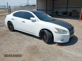 2014 Nissan Maxima S z VIN 1N4AA5AP1EC453114, wystawiony jako IAAI lot #41452898 z przebiegiem 126 865 mil mil oraz . Historia ofert i sprzedaży dostępna na DreamBid. Obrazek 1.