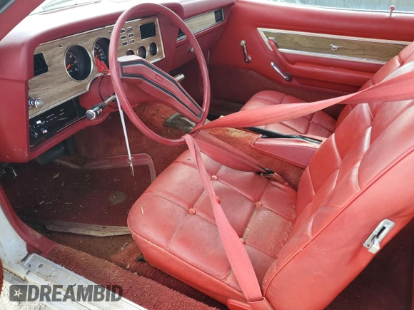 1977 Ford Mustang z VIN 7F04Z150204, wystawiony jako Copart lot #77276344 z przebiegiem 94 802 mil mil oraz Szkoda całkowita • Salvage title. Historia ofert i sprzedaży dostępna na DreamBid. Obrazek 7.