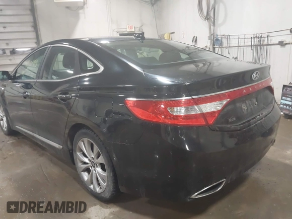 2013 Hyundai Azera z VIN KMHFG4JG4DA218608, wystawiony jako IAAI lot #41601792 z przebiegiem 101 846 mil mil oraz . Historia ofert i sprzedaży dostępna na DreamBid. Obrazek 3.
