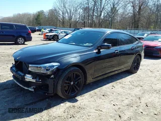 2018 BMW 6 Series 640i xDrive with VIN WBAJV6C5XJBK07708, listed as a IAAI auction lot 41784298 with 70,000 mi miles and . Bid and sale history available at carsss.com. Image 2.