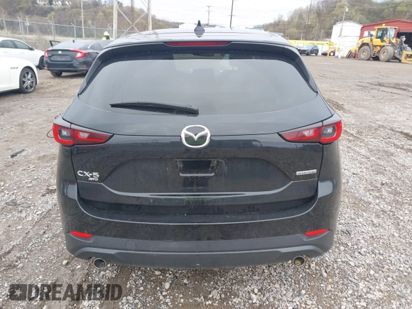 2023 Mazda CX-5 S Carbon Edition z VIN JM3KFBCM9P0130796, wystawiony jako IAAI lot #41956104 z przebiegiem 21 796 mil mil oraz . Historia ofert i sprzedaży dostępna na DreamBid. Obrazek 16.