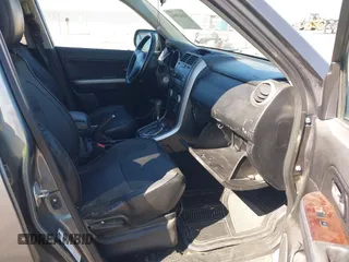 2006 Suzuki Grand Vitara Luxury z VIN JS3TE947164104381, wystawiony jako IAAI lot #41665094 z przebiegiem 145 874 mil mil oraz . Historia ofert i sprzedaży dostępna na DreamBid. Obrazek 5.