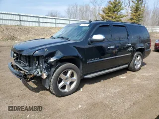 2013 Chevrolet Suburban LTZ with VIN 1GNSKKE71DR185334, listed as a Copart auction lot 52765025 with 193,154 mi miles and Salvage title. Bid and sale history available at DreamBid. Image 1.