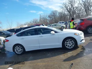 2013 Ford Fusion SE with VIN 3FA6P0HRXDR243139, listed as a IAAI auction lot 41441509 with 196,961 mi miles and . Bid and sale history available at DreamBid. Image 14.