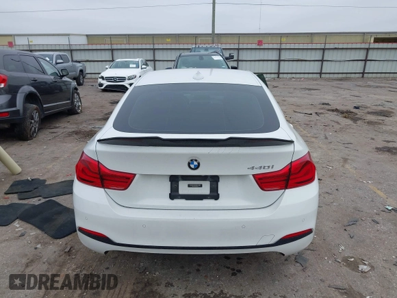 2018 BMW 4 Series 440i with VIN WBA4J5C56JBF07087, listed as a IAAI auction lot 41421921 with 61,601 mi miles and . Bid and sale history available at DreamBid. Image 16.