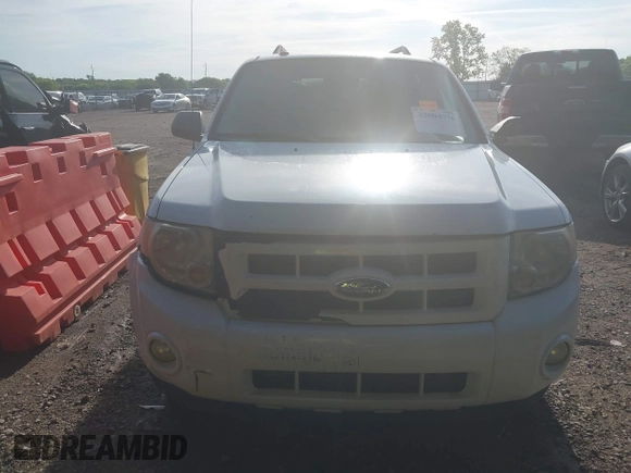 2009 Ford Escape Hybrid with VIN 1FMCU49399KC19803, listed as a IAAI auction lot 42004776 with 163,353 mi miles and . Bid and sale history available at DreamBid. Image 12.