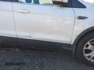 2013 Ford Escape SEL with VIN 1FMCU9HX2DUC40443, listed as a IAAI auction lot 42047208 with 194,413 mi miles. Bid and sale history available at carsss.com. Image 12.