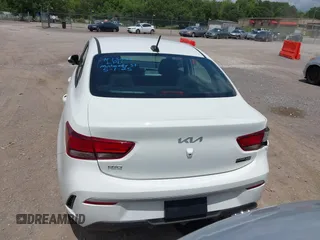 2023 Kia Rio S z VIN 3KPA24ADXPE613557, wystawiony jako IAAI lot #42198794 z przebiegiem 25 275 mil mil oraz . Historia ofert i sprzedaży dostępna na DreamBid. Obrazek 16.