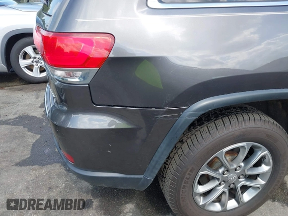 2014 Jeep Grand Cherokee Limited z VIN 1C4RJFBG2EC280821, wystawiony jako IAAI lot #42642389 z przebiegiem 115 375 mil mil oraz . Historia ofert i sprzedaży dostępna na DreamBid. Obrazek 18.