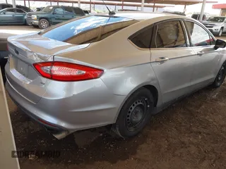2014 Ford Fusion S with VIN 3FA6P0G79ER170556, listed as a IAAI auction lot 42048157 with 141,538 mi miles and . Bid and sale history available at DreamBid. Image 4.