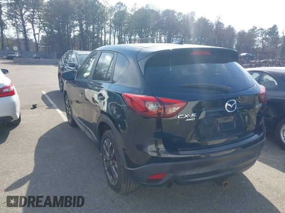 2016 Mazda CX-5 Grand Touring with VIN JM3KE4DY5G0681436, listed as a IAAI auction lot 41664780 with 172,199 mi miles. Bid and sale history available at carsss.com. Image 3.