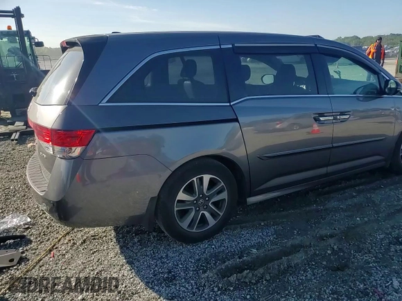 2014 Honda Odyssey Touring z VIN 5FNRL5H90EB007862, wystawiony jako Copart lot #60470005 z przebiegiem 135 686 mil mil oraz Czysty tytuł • Clean title. Historia ofert i sprzedaży dostępna na DreamBid. Obrazek 14.