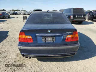 2004 BMW 3 Series 330i with VIN WBAEV53464KM34742, listed as a Copart auction lot 70491054 with 117,925 mi miles and Non Repairable. Bid and sale history available at carsss.com. Image 6.