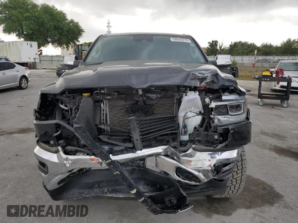 2022 Ram 1500 Laramie with VIN 1C6SRFJT4NN300006, listed as a Copart auction lot 54976775 with 61,436 mi miles and Salvage title. Bid and sale history available at DreamBid. Image 5.