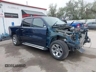2019 Ram 1500 Big Horn/Lone Star with VIN 1C6SRFFT7KN663677, listed as a IAAI auction lot 40325088 with 77,035 mi miles. Bid and sale history available at carsss.com. Image 1.