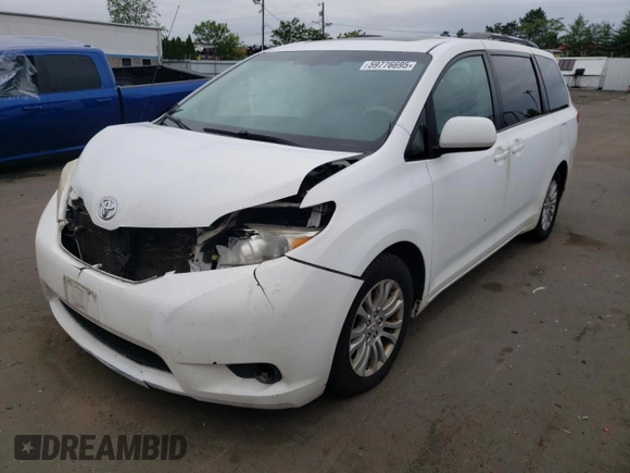 2011 Toyota Sienna XLE AAS with VIN 5TDYK3DCXBS063948, listed as a Copart auction lot 59776695 with 305,799 mi miles and Salvage title. Bid and sale history available at DreamBid. Image 1.