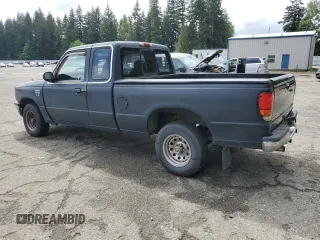 1994 Mazda B-Series Truck LE z VIN 4F4CR16X7RTM18152, wystawiony jako Copart lot #56992165 z przebiegiem 238 802 mil mil oraz Szkody całkowita. Historia ofert i sprzedaży dostępna na DreamBid. Obrazek 2.