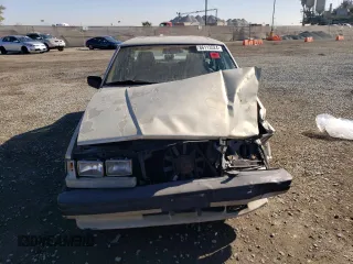 1988 Volvo 740 with VIN YV1FX8849J2284577, listed as a Copart auction lot 86113524 with 199,153 mi miles and Salvage Title. Bid and sale history available at carsss.com. Image 5.
