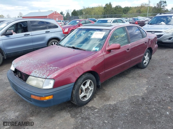 1997 Toyota Avalon XL with VIN 4T1BF12B5VU185685, listed as a IAAI auction lot 42037605 with 150,999 mi miles. Bid and sale history available at carsss.com. Image 2.